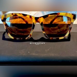 Cute, sporty Preowned Givenchy Tortoise Sunglasses.